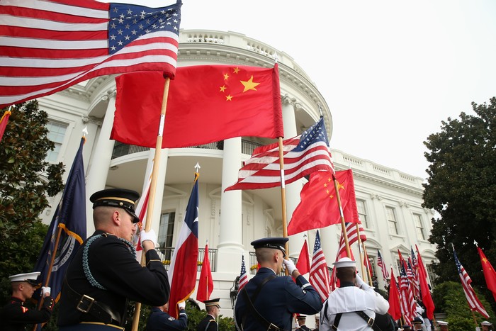 FILE - In this Sept. 25, 2015, file photo, a military honor guard await the arrival of Chinese President Xi Jinping for a state arrival ceremony at the White House in Washington. China on Tuesday, Dec. 8, 2020, lashed out at the U.S. over new sanctions against Chinese officials and the sale of more military equipment to Taiwan. (AP Photo/Andrew Harnik, File)
