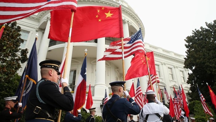 FILE - In this Sept. 25, 2015, file photo, a military honor guard await the arrival of Chinese President Xi Jinping for a state arrival ceremony at the White House in Washington. China on Tuesday, Dec. 8, 2020, lashed out at the U.S. over new sanctions against Chinese officials and the sale of more military equipment to Taiwan. (AP Photo/Andrew Harnik, File)