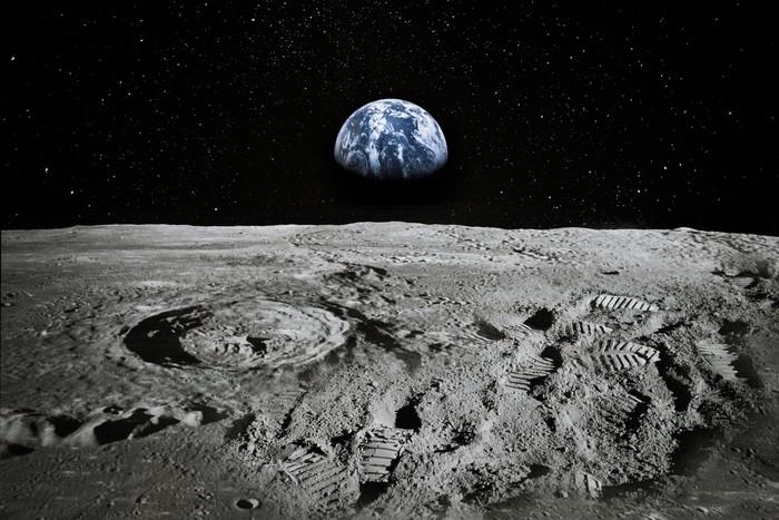 Satellite orbiting near moon.
