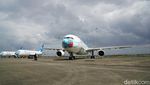 Potret Pesawat Garuda Indonesia  yang Bermasker Baru