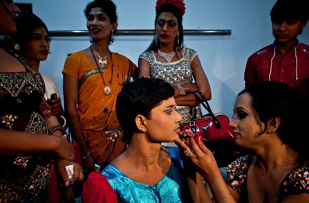 DHAKA, BANGLADESH - NOVEMBER 10:  Hijras, or transgenders,  get ready backstage before the Hijra talent show, part of the first ever event called Hijra Pride 2014, on November 10, 2014 in Dhaka, Bangladesh.  In 2013 Bangladesh officially recognized Hijras as a third gender, though homosexuality still remains illegal. Despite these strides Hijras continue to face violence and harassment as part of their daily life in Bangladesh. (Photo by Allison Joyce/Getty Images)