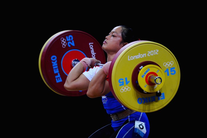 LONDON, ENGLAND - JULY 29:  Citra Febrianti of Indonesia competes in the Womens 53kg Weightlifting on Day 2 of the London 2012 Olympic Games at ExCeL on July 29, 2012 in London, England.  (Photo by Laurence Griffiths/Getty Images)