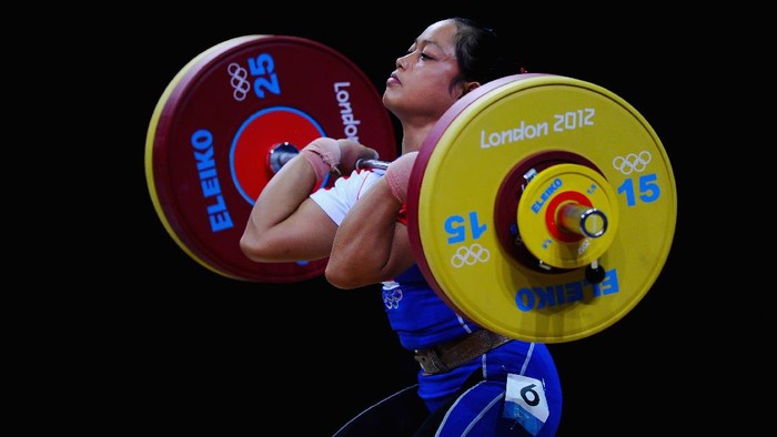 LONDON, ENGLAND - JULY 29:  Citra Febrianti of Indonesia competes in the Womens 53kg Weightlifting on Day 2 of the London 2012 Olympic Games at ExCeL on July 29, 2012 in London, England.  (Photo by Laurence Griffiths/Getty Images)
