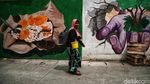 Warna-warni Mural Bikin Kampung Japat Embrat Lebih Hidup