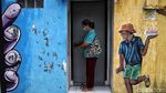 Warna-warni Mural Bikin Kampung Japat Embrat Lebih Hidup