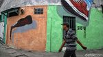 Warna-warni Mural Bikin Kampung Japat Embrat Lebih Hidup