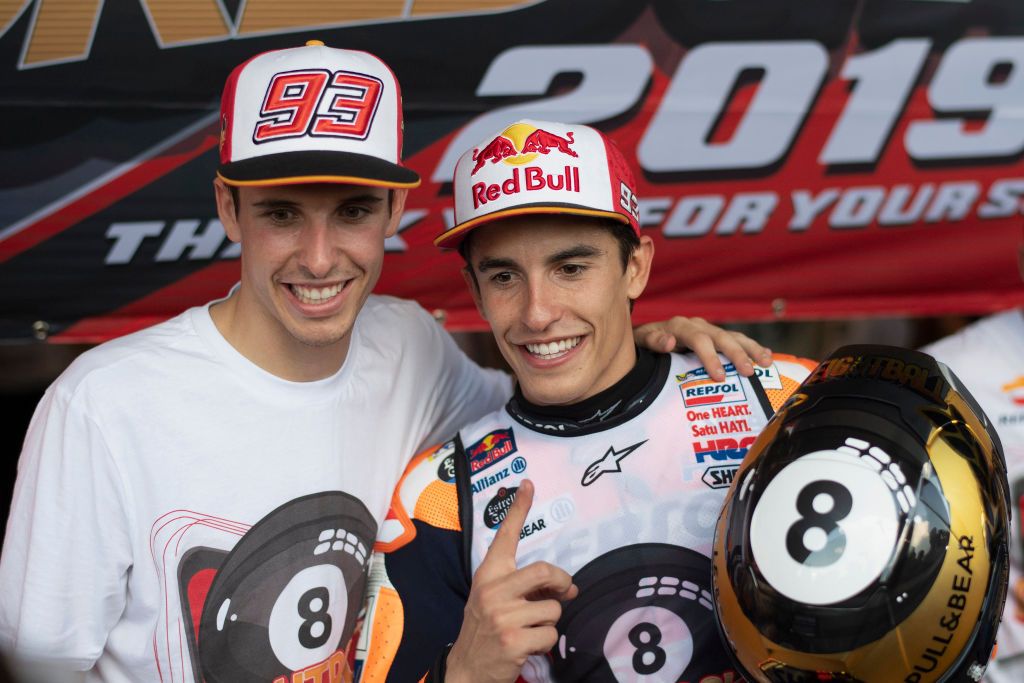 BANGKOK, THAILAND - OCTOBER 06: Marc Marquez of Spain and Repsol Honda Team  celebrates the MotoGP victory and the 2019 MotoGP Championship with his brother Alex Marquez (L) at the end of the MotoGP race  during the MotoGP of Thailand - Race on October 06, 2019 in Bangkok, Thailand. (Photo by Mirco Lazzari gp/Getty Images)