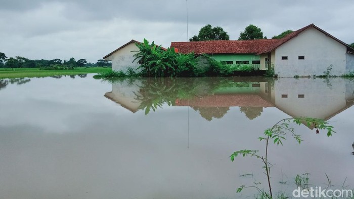 Luapan sungai di Desa Jetis, Kecamatan Juwiring, Klaten, Sabtu (12/12/2020).