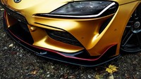 Dari sisi eksterior, Toyota Supra garapan Manhart ini telah dibikin lebih ceper. Sebagai finishing, menggunakan balutan warna emas berkilauan, dengan aksen hitam dan merah yang menegaskan kesan sporty. Foto: Dok. Manhart Peformance