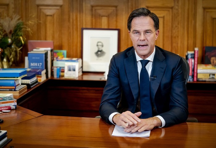 Prime Minister Mark Rutte adresses the nation in het Torentje about new measures against the novel coronavirus Covid-19, in The Hague, on December 14, 2020. - The cabinet has decided to introduce a strict lockdown to put an end to the sharp increase in the number of new corona infections. Most shops, all schools and other institutions such as theaters and museums have to close their doors for at least a month. (Photo by Bart Maat / ANP / AFP) / Netherlands OUT
