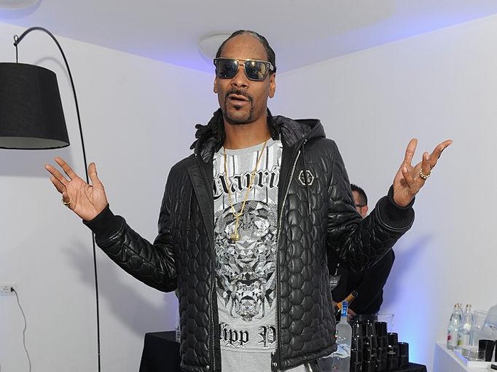 PARIS, FRANCE - MARCH 03:  Hip Hop Artist Snoop Dogg performs during the ETAM show as part of the Paris Fashion Week Womenswear Fall/Winter 2015/2016 at Piscine Molitor on March 3, 2015 in Paris, France.  (Photo by Kristy Sparow/Getty Images for ETAM)