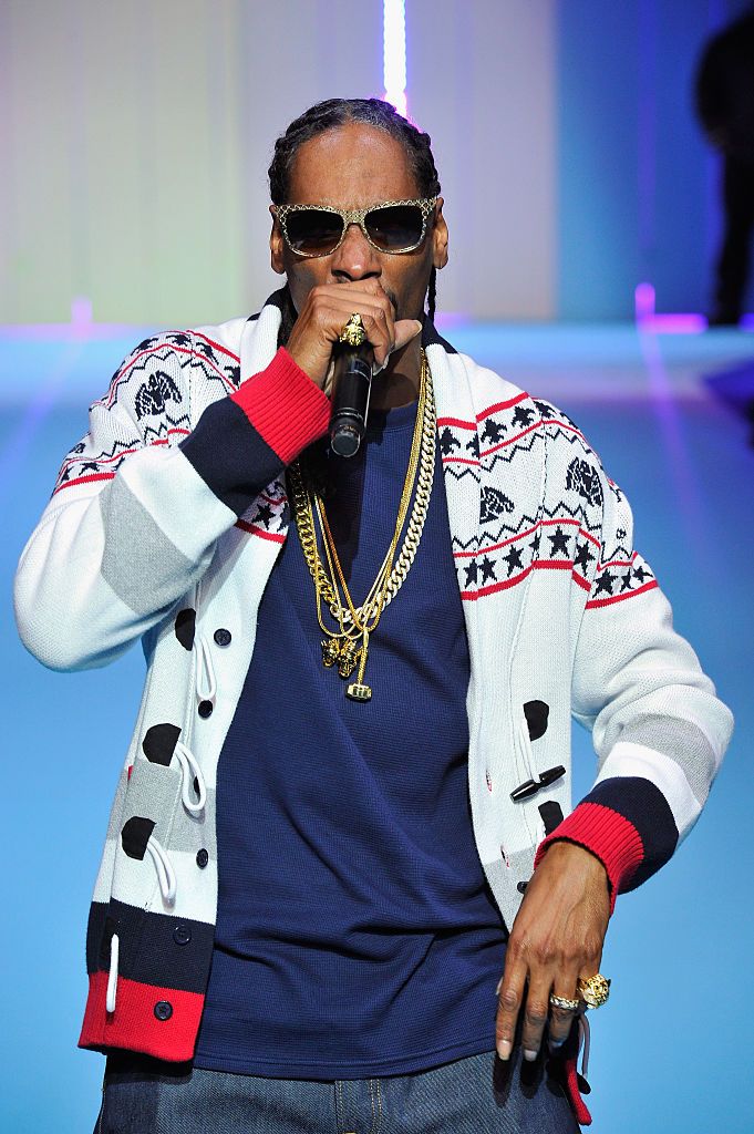 PARIS, FRANCE - MARCH 03:  Hip Hop Artist Snoop Dogg performs during the ETAM show as part of the Paris Fashion Week Womenswear Fall/Winter 2015/2016 at Piscine Molitor on March 3, 2015 in Paris, France.  (Photo by Kristy Sparow/Getty Images for ETAM)