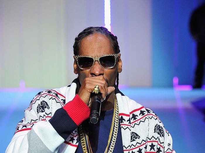 PARIS, FRANCE - MARCH 03:  Hip Hop Artist Snoop Dogg performs during the ETAM show as part of the Paris Fashion Week Womenswear Fall/Winter 2015/2016 at Piscine Molitor on March 3, 2015 in Paris, France.  (Photo by Kristy Sparow/Getty Images for ETAM)