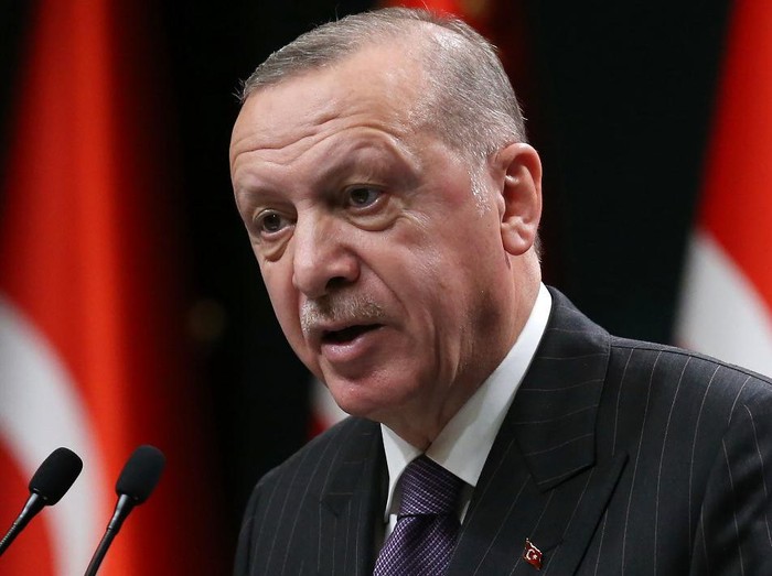 President of Turkey Recep Tayyip Erdogan makes a statement after chairing the cabinet meeting in Ankara, on December 14, 2020. (Photo by Adem ALTAN / AFP)