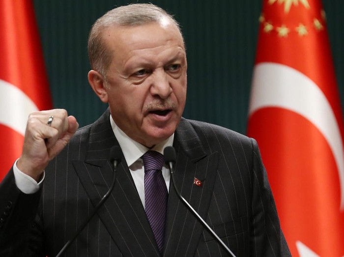 President of Turkey Recep Tayyip Erdogan makes a statement after chairing the cabinet meeting in Ankara, on December 14, 2020. (Photo by Adem ALTAN / AFP)