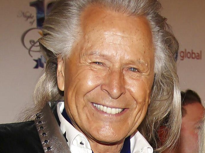 Peter Nygard FILE - In this March 2, 2014, file photo, Peter Nygard attends the 24th Night of 100 Stars Oscars Viewing Gala at The Beverly Hills Hotel in Beverly Hills, Calif. Nygard faces criminal charges in New York after his Canadian arrest on charges alleging that he dangled opportunities in fashion and modeling to lure dozens of women and girls to have sex with himself and others. The 79-year-old Nygard awaited an appearance in a Winnipeg courtroom after his Monday, Dec. 14, 2020 arrest in Winnipeg, Manitoba, Canada by Canadian authorities at the request of the United States. (Annie I. Bang /Invision/AP, File)