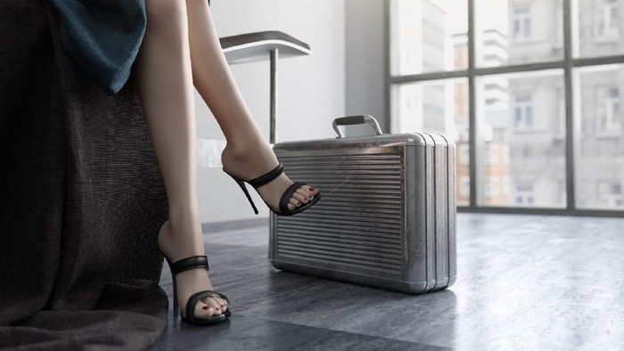 Long Woman Legs with metal case  concept background