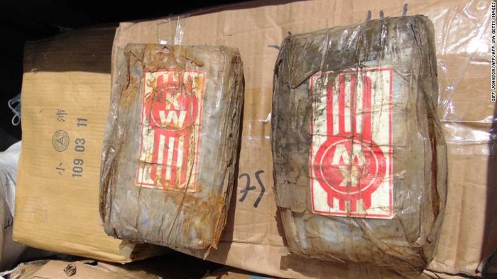 This December 15, 2020 photo shows a box filled with 2.2-pound (1-kg) bricks of cocaine found on a boat that washed up in the Marshall Islands.