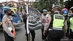 Polisi Hadang Massa Aksi 1812 di Pasar Jumat