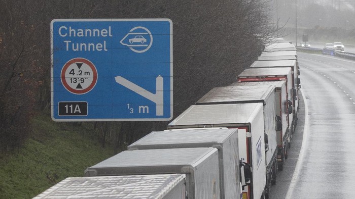 DOVER, ENGLAND - DECEMBER 21: Lorries queue during operation stack on the M20 towards Dover on December 21, 2020 in Dover, England. Citing concern over a new covid-19 variant and Englands surge in cases, France temporarily closed its border with the UK late Sunday, halting freight and ferry departures from the port of Dover for 48 hours. France also joined several other European countries in stopping rail and air travel from the UK. (Photo by Dan Kitwood/Getty Images)