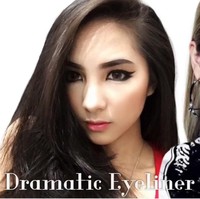Setelah Park Bom, Devienna juga pernah bertransformasi menjadi CL yang identik dengan permainan eyeliner dan bulu mata. Bisa ditengok untuk kamu yang berani bereksperimen dengan makeup. Foto: Instagram/YouTube Devienna