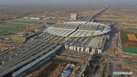 Dilihat dari atas, bangunannya menyerupai titik embun di atas daun teratai. Atau bahkan seperti pesawat luar angkasa dengan desain futuristik. Foto: Dok. Xinhua