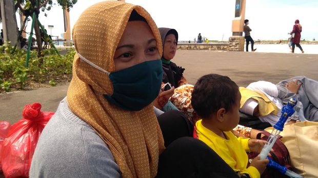Yosi memilih liburan ke kawasan wisata Ancol.
