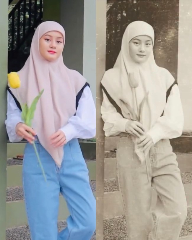 Dalam video yang berdurasi 34 detik itu Dinda Hauw memperlihatkan gaya vintage dengan memakai hijab ala siswi madrasah. Dinda memakai hijab segiempat yang sengaja ia bentuk menutupi sebagian dahinya.Foto: Instagram @dindahw.