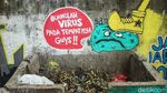 Mural Lawan COVID-19 Mejeng di Cakung