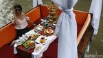 Sensasi Makan ala Sultan di Tengah Aliran Sungai Wos Bali
