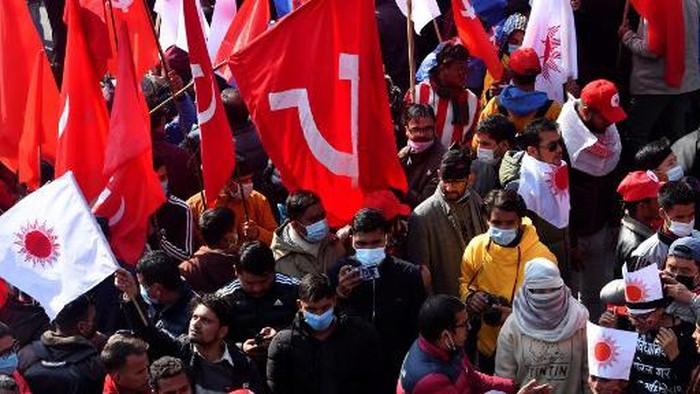 Protesters shout slogans during a demonstration against the dissolution of the countrys parliament in Kathmandu on December 29, 2020. (Photo by PRAKASH MATHEMA / AFP)