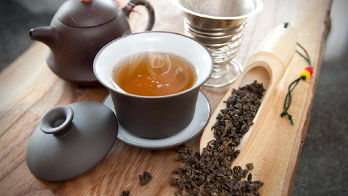 Dry pea flowers. Organic thai butterfly pea tea on blue background