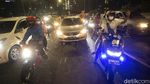 00.00 WIB di Jembatan Kuningan