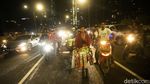 00.00 WIB di Jembatan Kuningan
