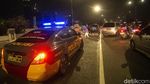 00.00 WIB di Jembatan Kuningan