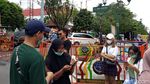 Foto: Pagar Besi Oranye Kelilingi Plang Jalan Malioboro
