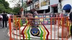 Foto: Pagar Besi Oranye Kelilingi Plang Jalan Malioboro