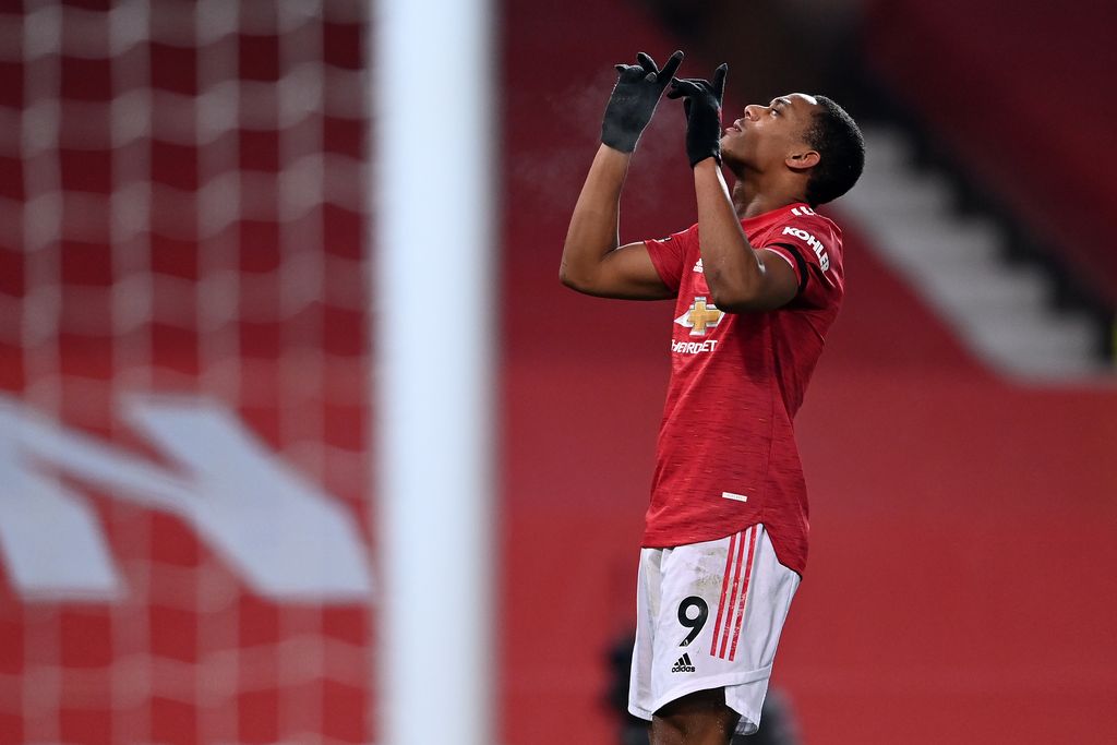 Anthony Martial MANCHESTER, ENGLAND - JANUARY 01: Anthony Martial of Manchester United celebrates after scoring their team's first goal during the Premier League match between Manchester United and Aston Villa at Old Trafford on January 01, 2021 in Manchester, England. The match will be played without fans, behind closed doors as a Covid-19 precaution. (Photo by Laurence Griffiths/Getty Images)