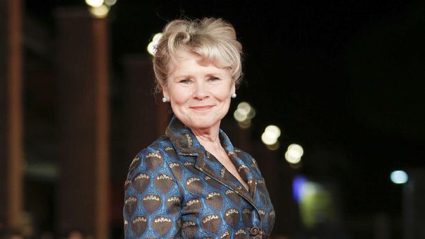 FILE - This Oct. 19, 2019 file photo shows actress Imelda Staunton on the red carpet for the movie 