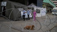 Pemerintah Thailand juga memutuskan untuk memberlakukan kebijakan lockdown Kota Bangkok, akibat adanya lonjakan kasus virus Corona. Sekolah-sekolah yang ada di wilayah tersebut juga ditutup sementara selama dua pekan. AP Photo/Gemunu Amarasinghe  