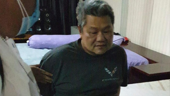 Augustinus, buronan dengan status terpidana 8 tahun penjara atas korupsi Rp 13 miliar.