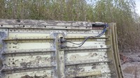 Terlihat ada aksara China di bagian puing logam berbahan sejenis aluminium tersebut (dok. Polda Kalteng)