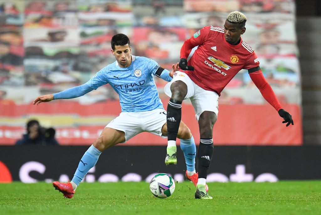 Joao Cancelo MANCHESTER, ENGLAND - NOVEMBER 08: Joao Cancelo of Manchester City on the ball during the Premier League match between Manchester City and Liverpool at Etihad Stadium on November 08, 2020 in Manchester, England. Sporting stadiums around the UK remain under strict restrictions due to the Coronavirus Pandemic as Government social distancing laws prohibit fans inside venues resulting in games being played behind closed doors. (Photo by Clive Brunskill/Getty Images)