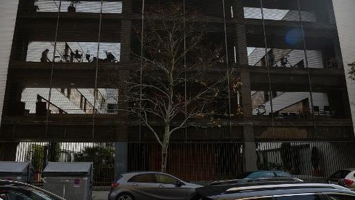 A picture shows the facade of the Adorea-DomusVi elderly care residence where a fire broke out in Seville on January 6, 2021. - An 89-year-old woman died and another 18 pensioners were hospitalised, some with severe burns, after a fire ripped through the elderly care residence in Spain, rescuers said. (Photo by CRISTINA QUICLER / AFP)