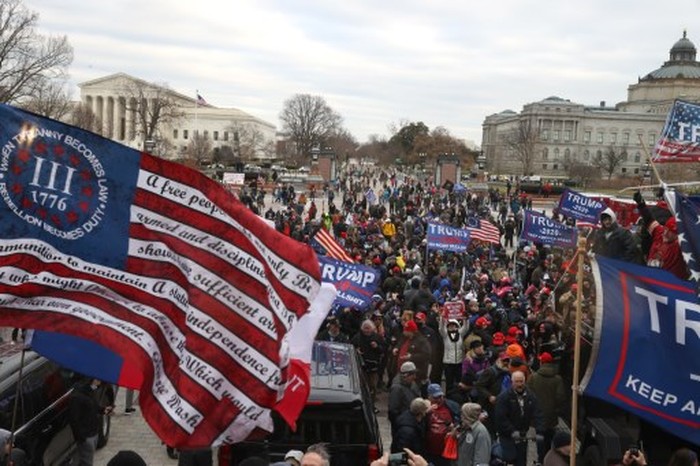 WASHINGTON, DC - JANUARY 06: Protesters gather on the U.S. Capitol Building on January 06, 2021 in Washington, DC. Pro-Trump protesters entered the U.S. Capitol building after mass demonstrations in the nations capital during a joint session Congress to ratify President-elect Joe Bidens 306-232 Electoral College win over President Donald Trump.   Tasos Katopodis/Getty Images/AFP