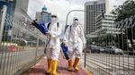 Penyemprotan Disinfektan di Halte Busway