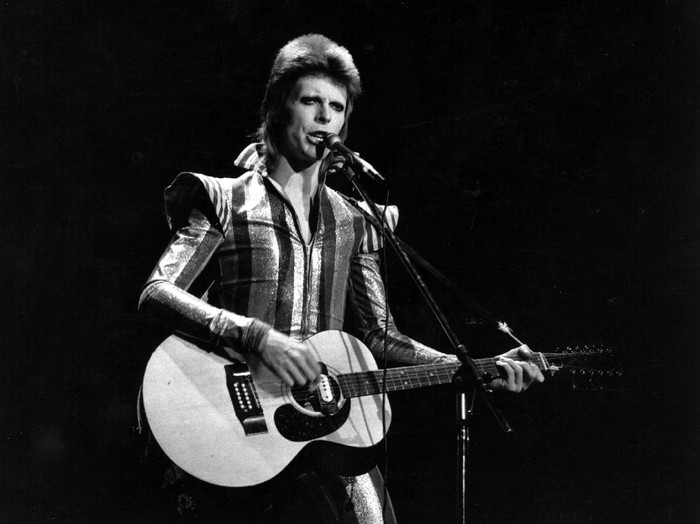 3rd July 1973:  David Bowie performs his final concert as Ziggy Stardust at the Hammersmith Odeon, London. The concert later became known as the Retirement Gig.  (Photo by Express/Express/Getty Images)