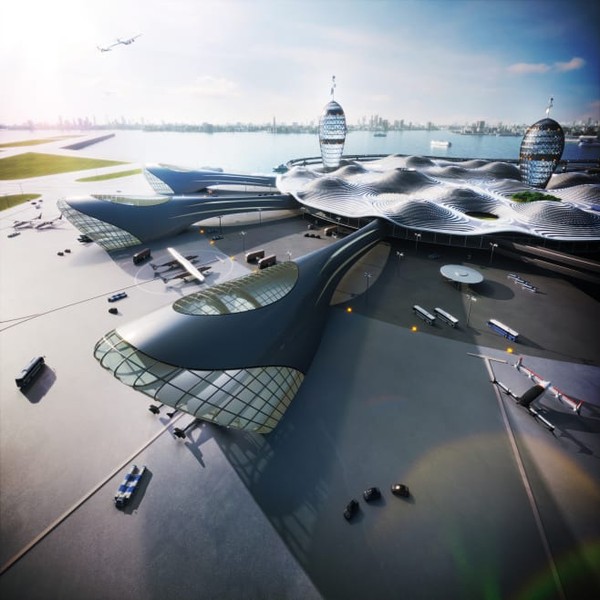 Desain terbaru memperlihatkan bangunan menara baja dan kaca berbentuk silinder menonjol melalui atap panel surya berbentuk bundar. Bangunan ini membentuk Kota Bandara Antariksa atau Spaceport City. Desain terbaru memperlihatkan bangunan menara baja dan kaca berbentuk silinder menonjol melalui atap panel surya berbentuk bundar. Bangunan ini membentuk Kota Bandara Antariksa atau Spaceport City.