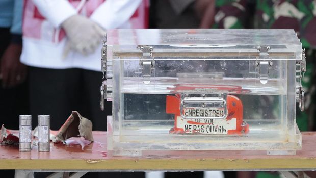 A box containing the flight data recorder recovered from the crash site of the Sriwijaya Air flight SJ-182 in the Java Sea sits on display at Tanjung Priok Port, Tuesday, Jan. 12, 2021. Indonesian navy divers searching the ocean floor on Tuesday recovered the flight data recorder from a Sriwijaya Air jet that crashed into the Java Sea with 62 people on board. (AP Photo/Dita Alangkara)