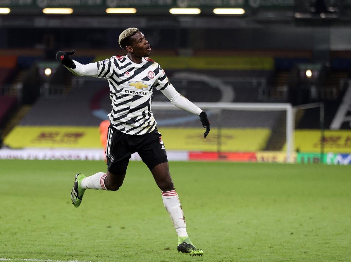 Gelandang Manchester United, Paul Pogba, merayakan golnya ke gawang Burnley. (Foto: Clive Brunskill/Getty Images)